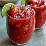 Refreshing dragon drink refresher with coconut milk, vibrant pink and creamy, perfect for summer sipping.