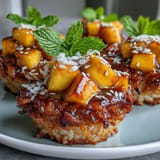 Sweet Coconut Mango Sticky Rice Cups, a tropical, creamy treat topped with vibrant mango chunks.