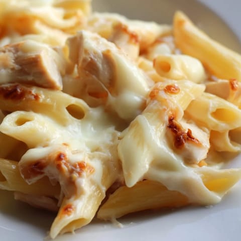 A hearty casserole of tender chicken and penne pasta coated in creamy ranch sauce, baked until bubbly.